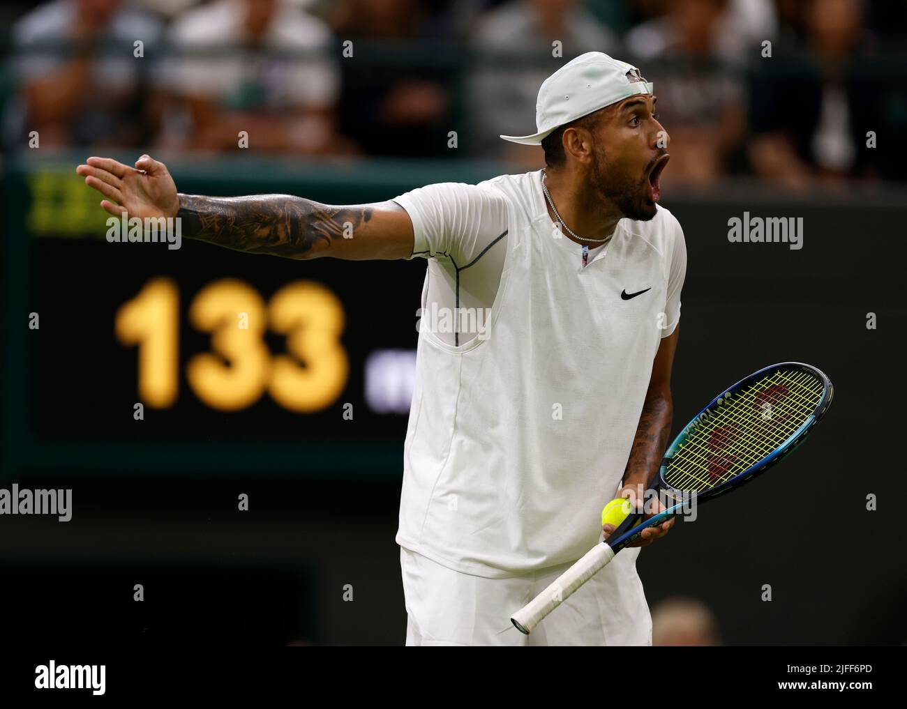 Nick Kyrgios reacts during his Men's Singles third round match against Stefanos Tsitsipas during day six of the 2022 Wimbledon Championships at the All England Lawn Tennis and Croquet Club, Wimbledon. Picture date: Saturday July 2, 2022. Stock Photo