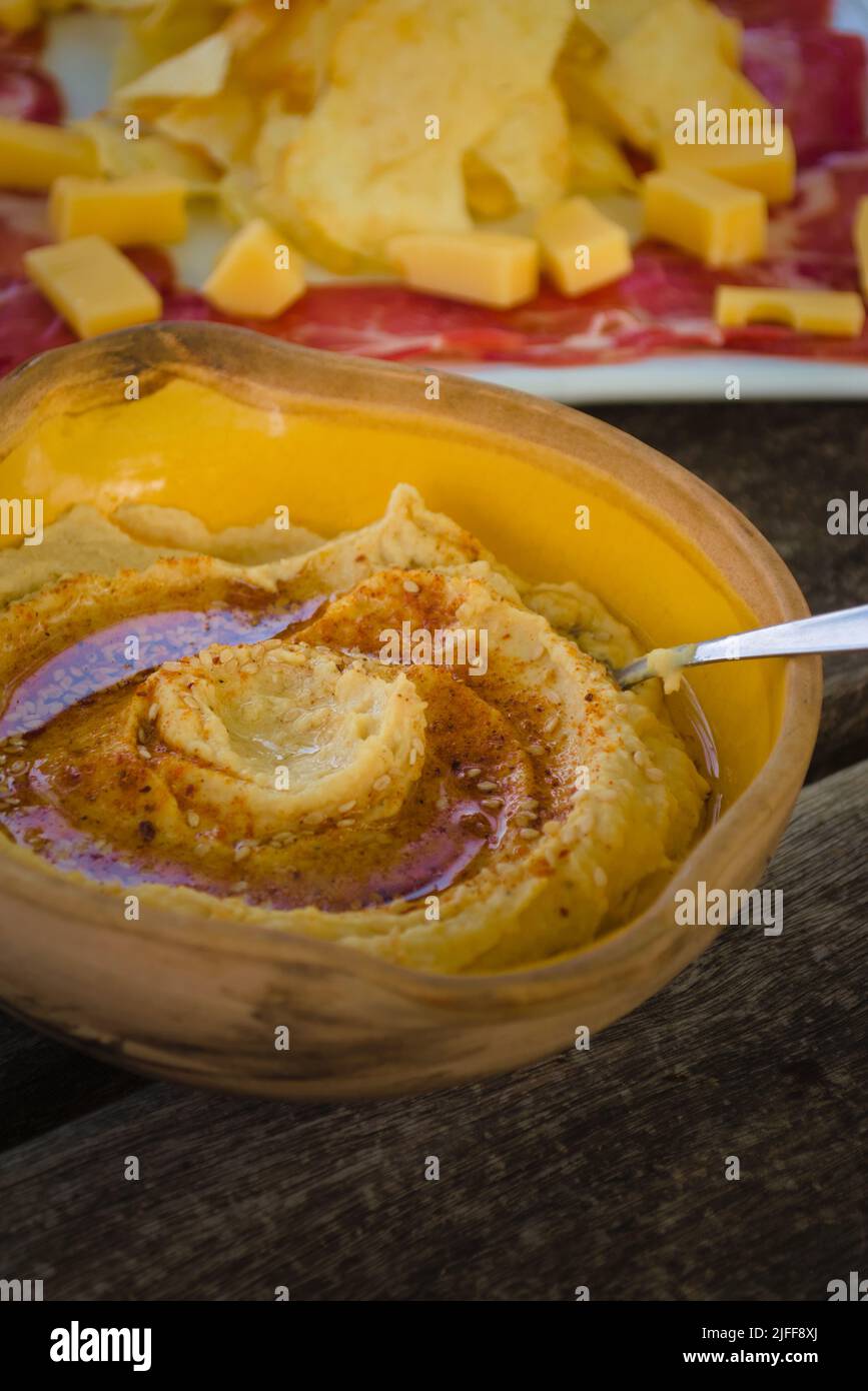 Bowl of hummus, close up. Traditional middle east appetizer. Stock Photo