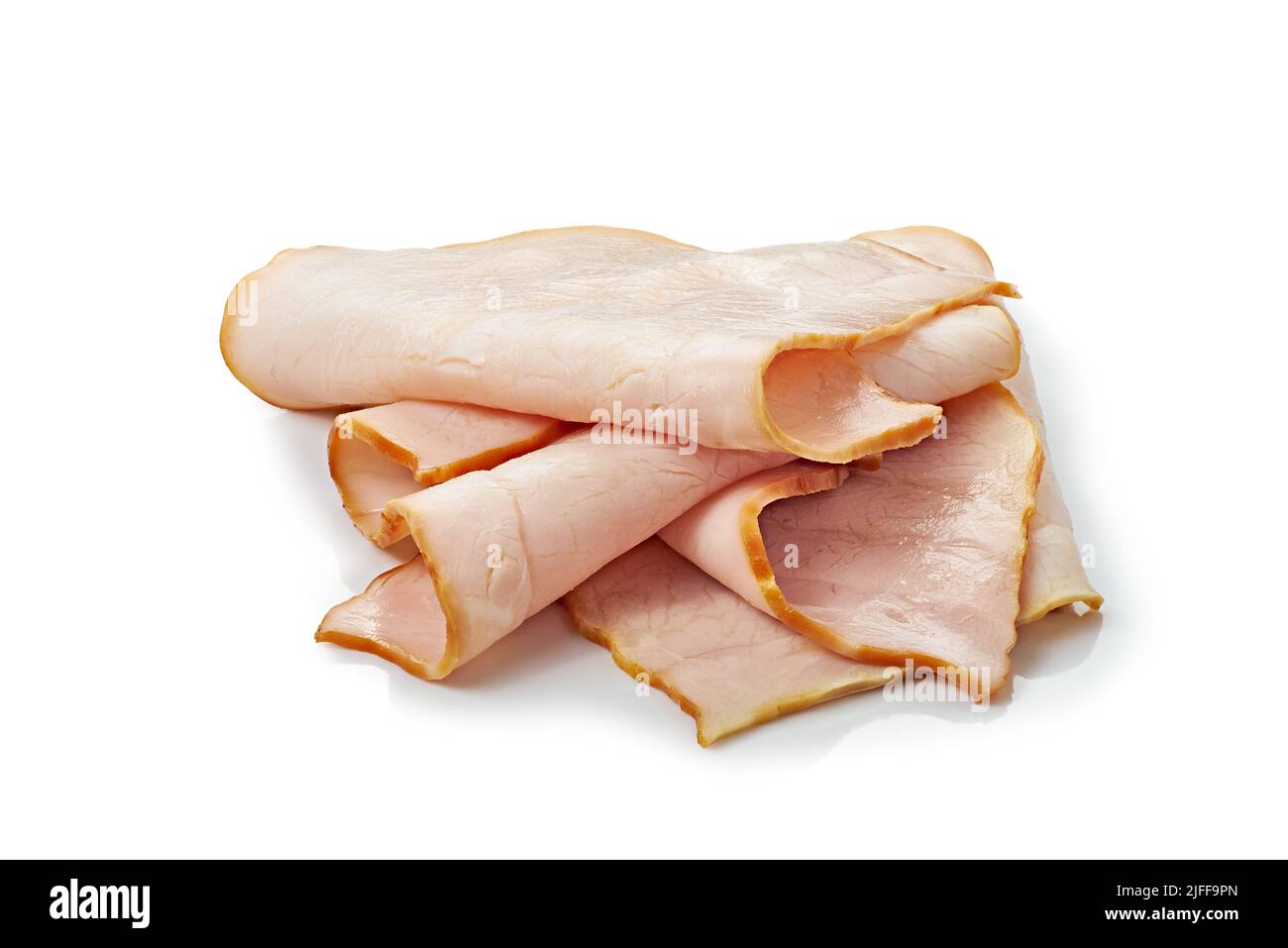 Thin smoked ham slices on white background Stock Photo