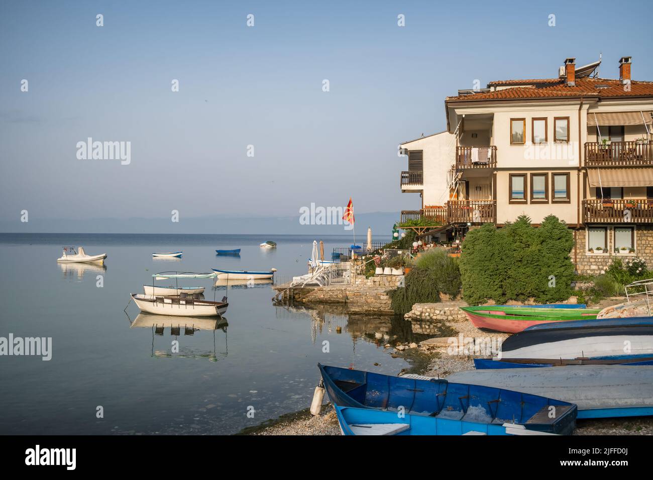 Calm early morning scene at Ohrid lake in North Macedonia Stock Photo