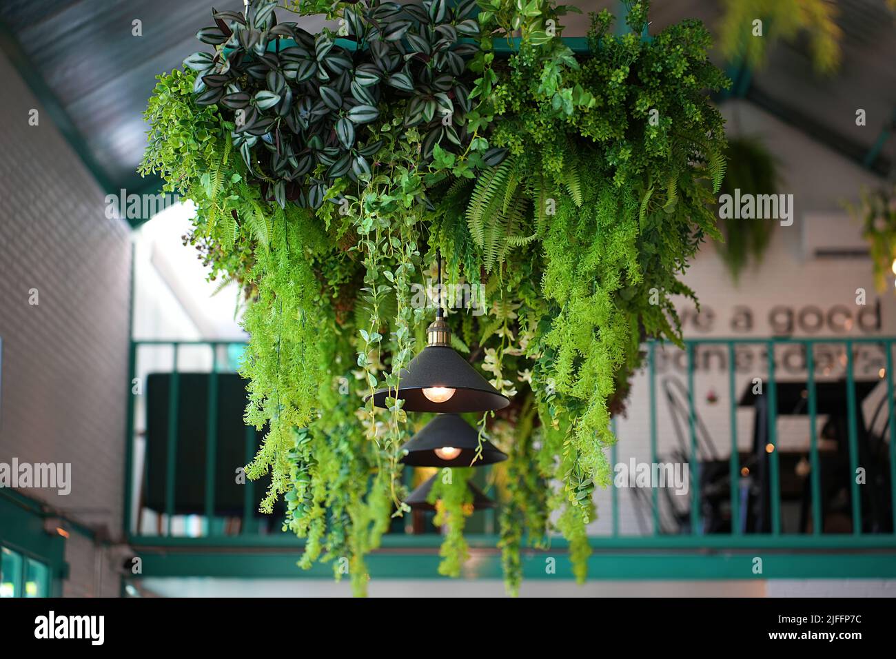Fake plant hanging decoration. The artificial colorful flowers hanging