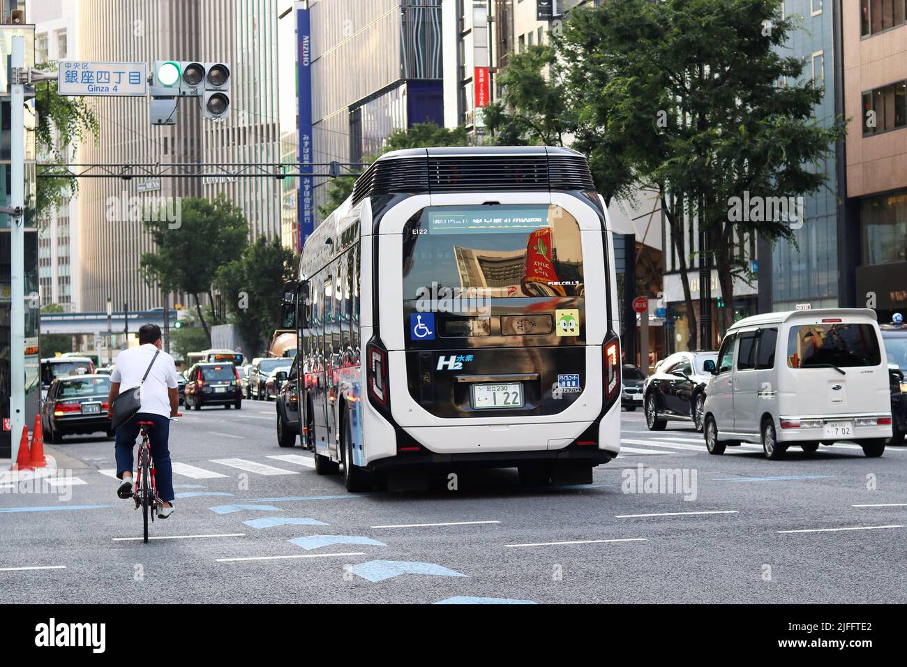 TOKYO, JAPAN June 29, 2022 Late afternoon traffic in Tokyo's Ginza area including a hydrogn
