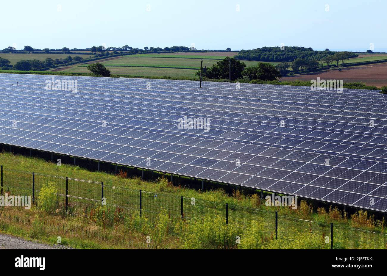 Solar Farm, in rural landscape, panels, solar panels, green power, energy, Thornham, Norfolk, England, UK Stock Photo