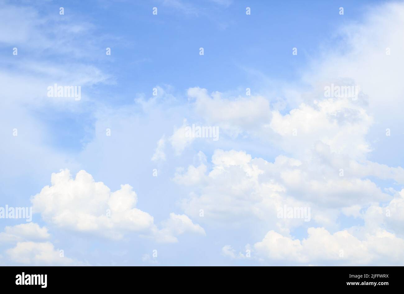 cloudscape with white clouds and blue sky Stock Photo - Alamy