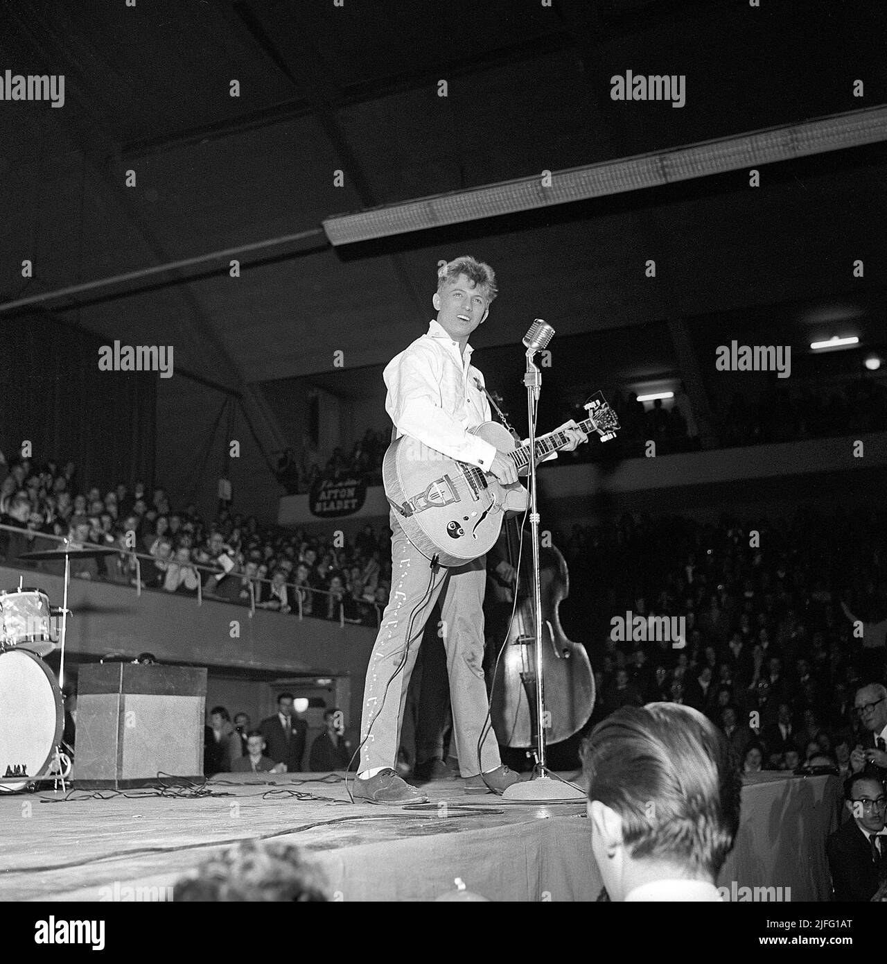 Tommy Steele. English entertainer regarded as Britain's first teen idol and rock and roll star. Born december 17 1936. Picture taken when he performed in Stockholm Sweden April 19 1958. Stock Photo