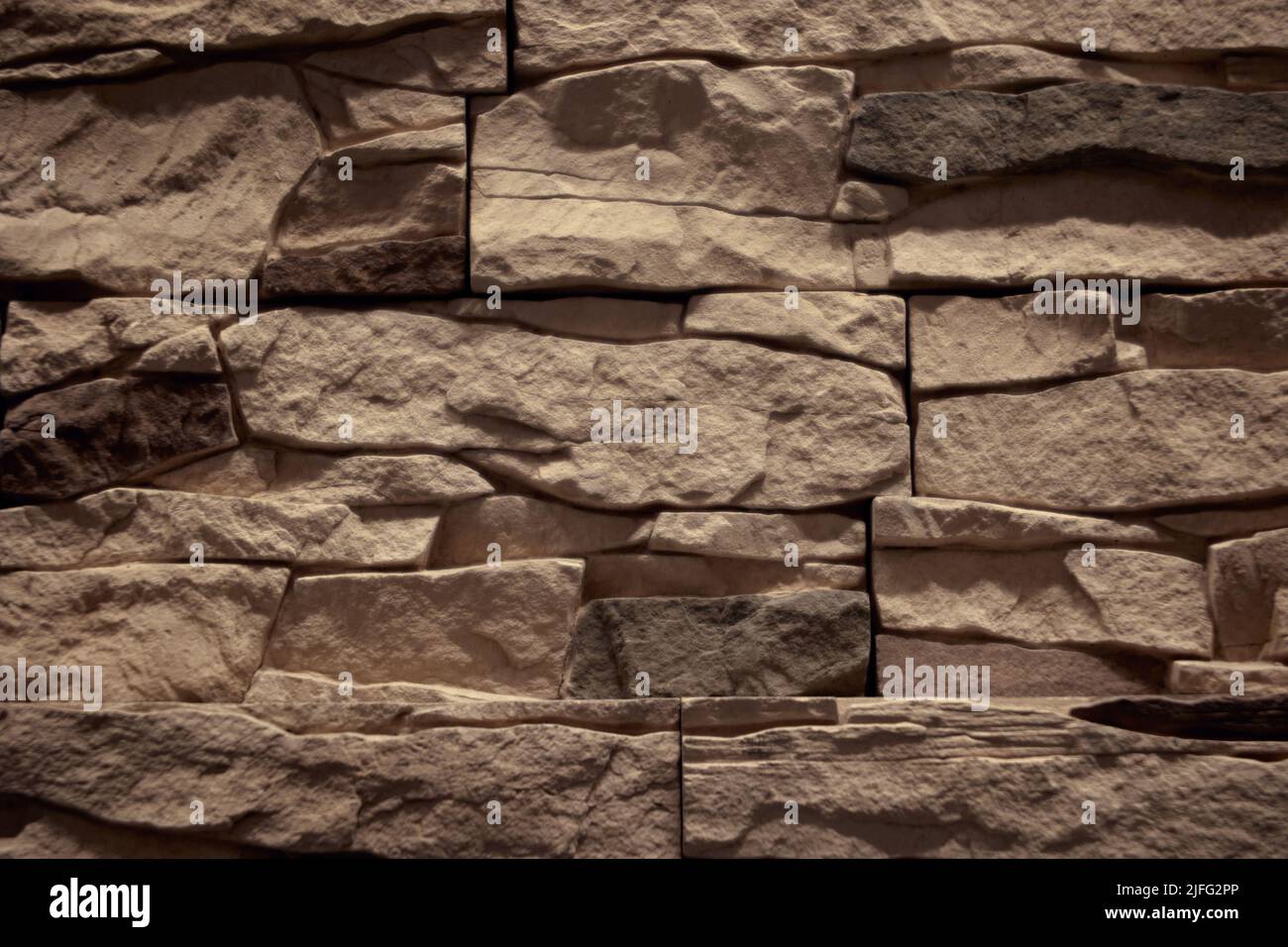 Wall of natural stone closeup texture background Stock Photo