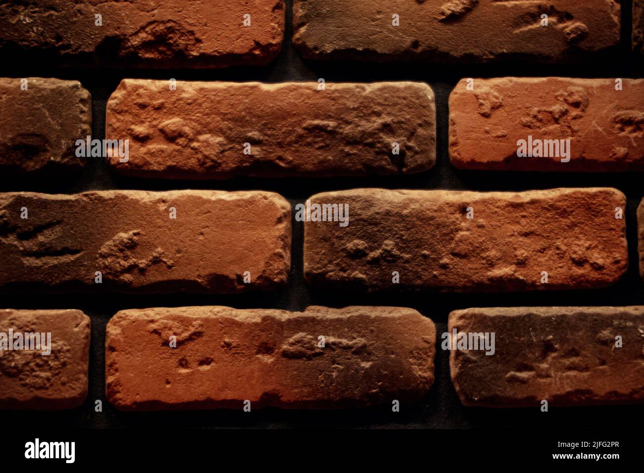 Red brick wall closeup texture background Stock Photo