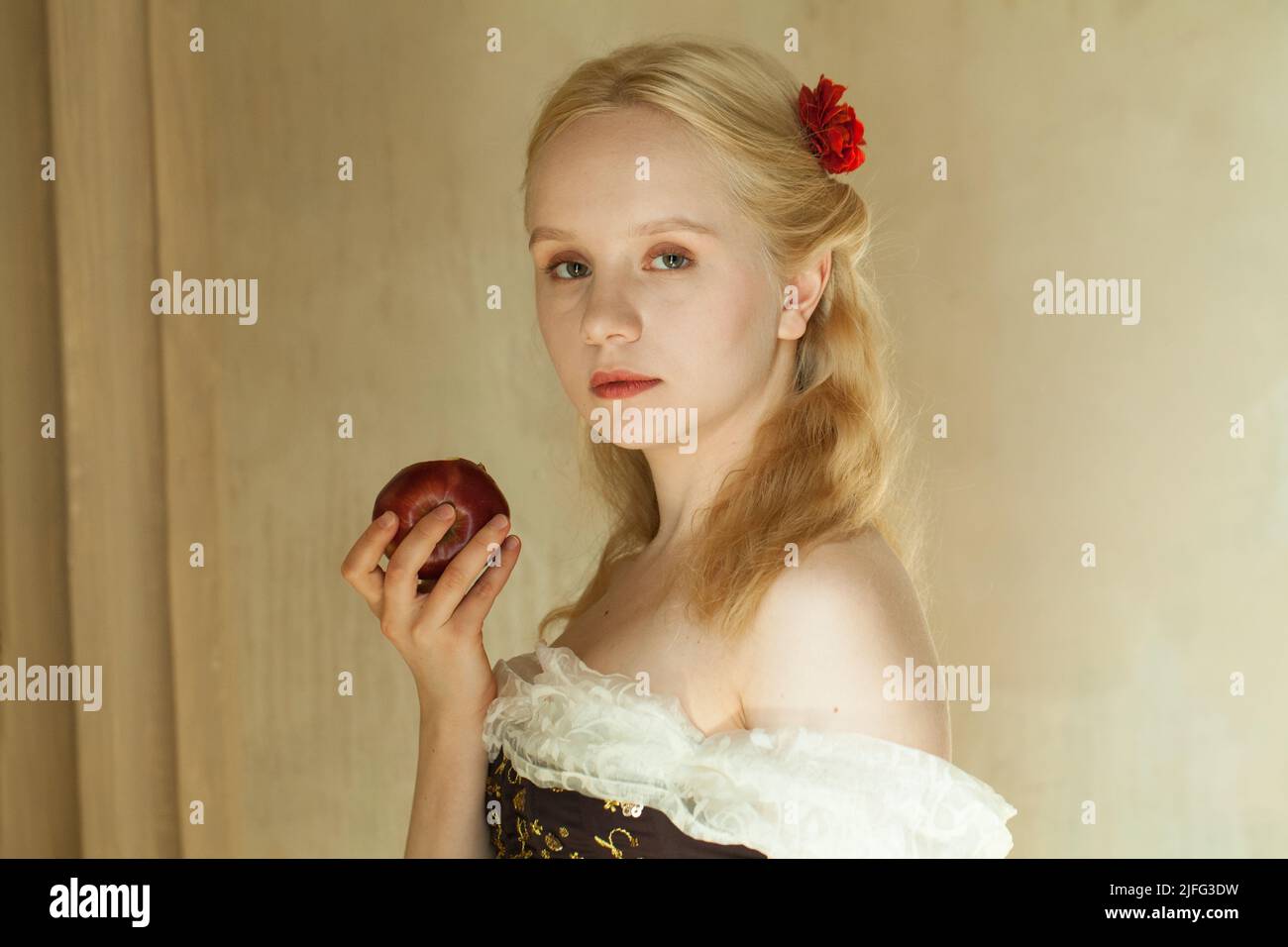 Romantic vintage woman with red apple Stock Photo