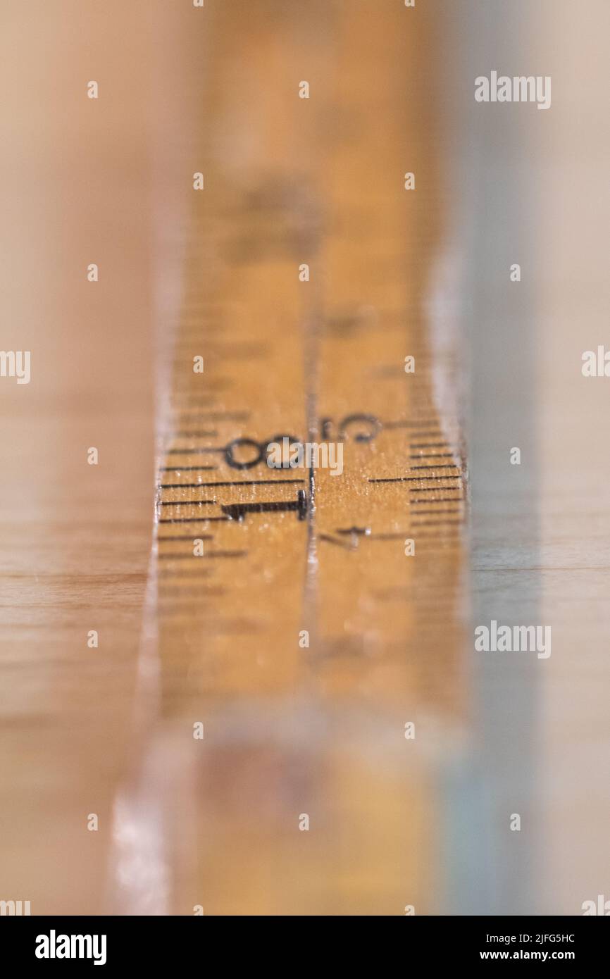 Closeup or macro of numbers on a ruler for construction work Stock Photo