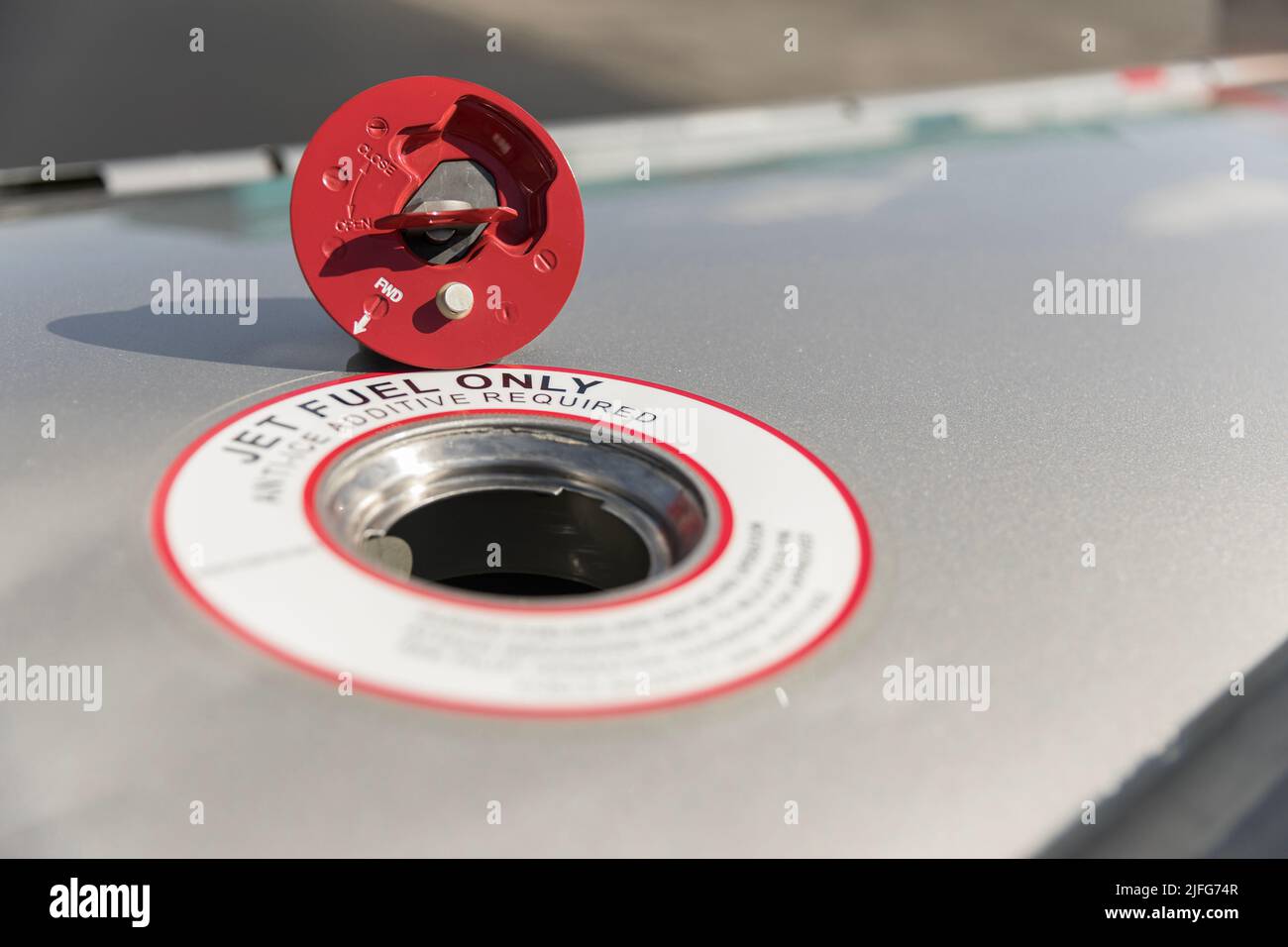 Fuel nozzle filling up aircraft, refueling jet fuel in an aircraft wing