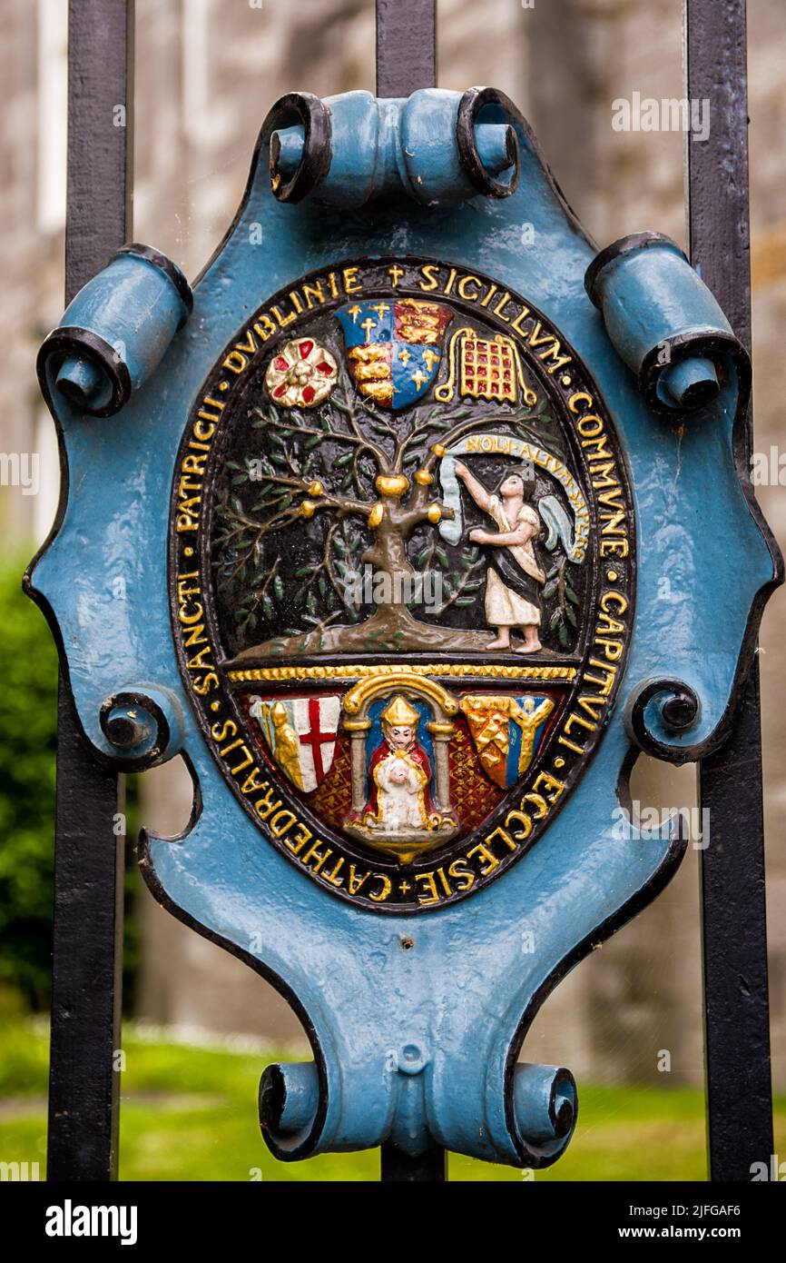 Dublin, Ireland - May 22, 2022: Coat of arms as relief on an iron gate of St. Patrick's Cathedral, in the centre of Dublin, Ireland. Stock Photo