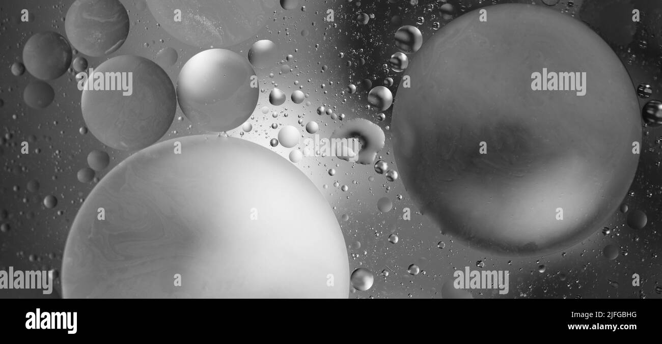 Black and white oil drops on the water surface Stock Photo Alamy