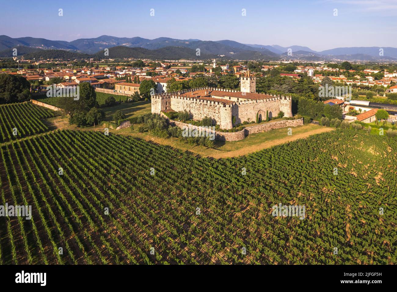 Aerial view of the medieval castle among the vineyards, Passirano, Franciacorta, Italy,  Stock Photo