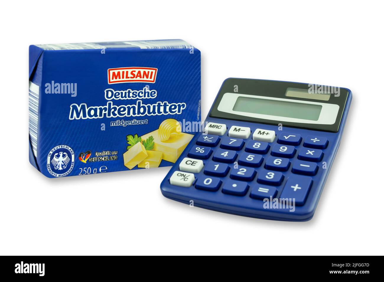 Milsani Deutsche Butter mit Rechner auf weissem Hintergrund Stock Photo