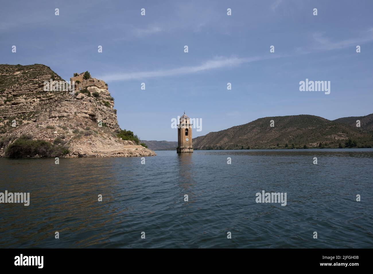 Tower of the Church of San Juan Evangelista in the Ribarroja reservoir, Aragon, Spain Stock Photo