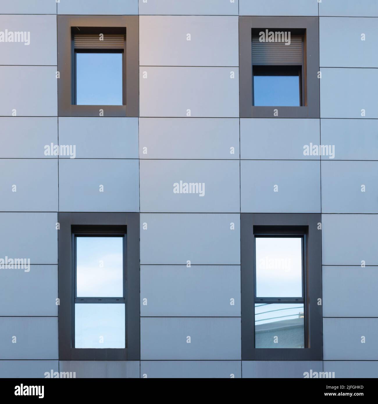 Urban architecture. Detail of a facade with closed windows. Stock Photo