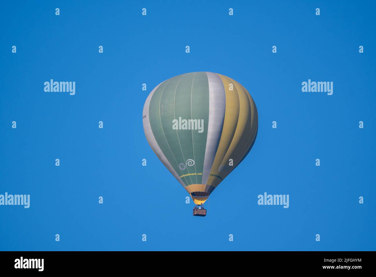 hot air balloon on a blue sky,  Santpedor, Catalonia, Spain Stock Photo