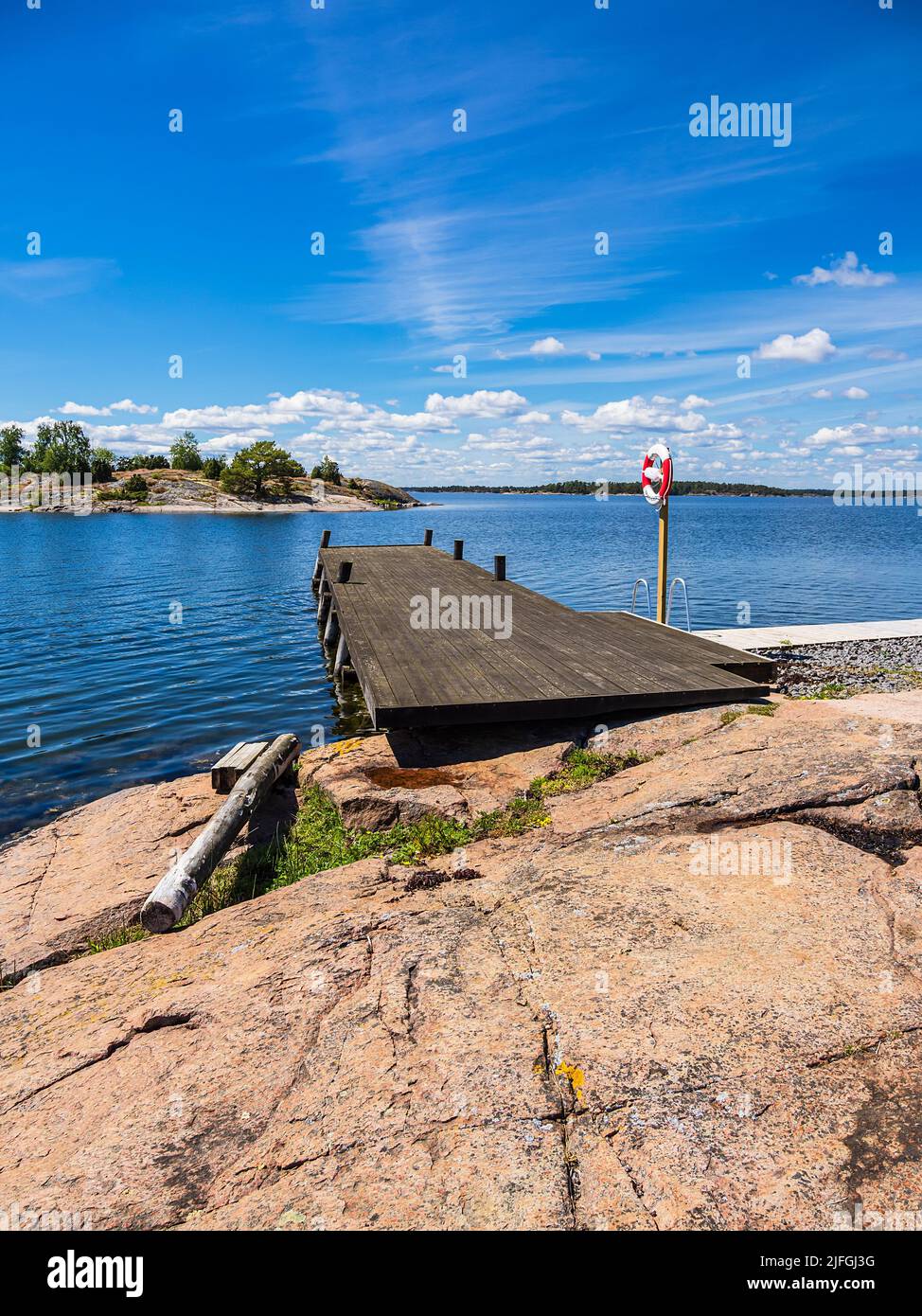 Landscape with rocks and landing stage on the island Sladö in Sweden. Stock Photo