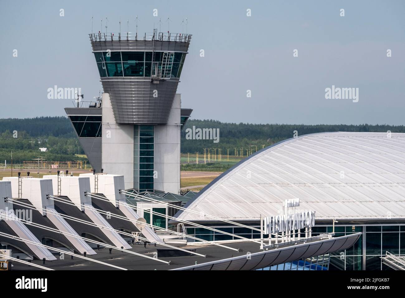 Helsinki / Finland - JULY 2, 2022: Air traffic control tower at the Helsinki Airport, operated by Finavia Stock Photo