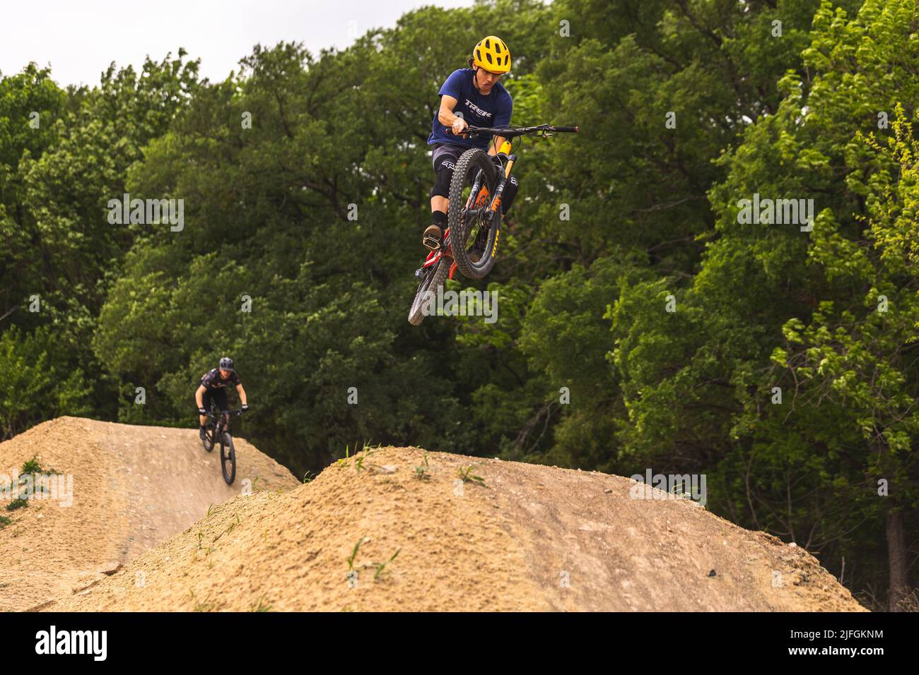 A rider jumping on a bike during the grand opening at Erwin park in