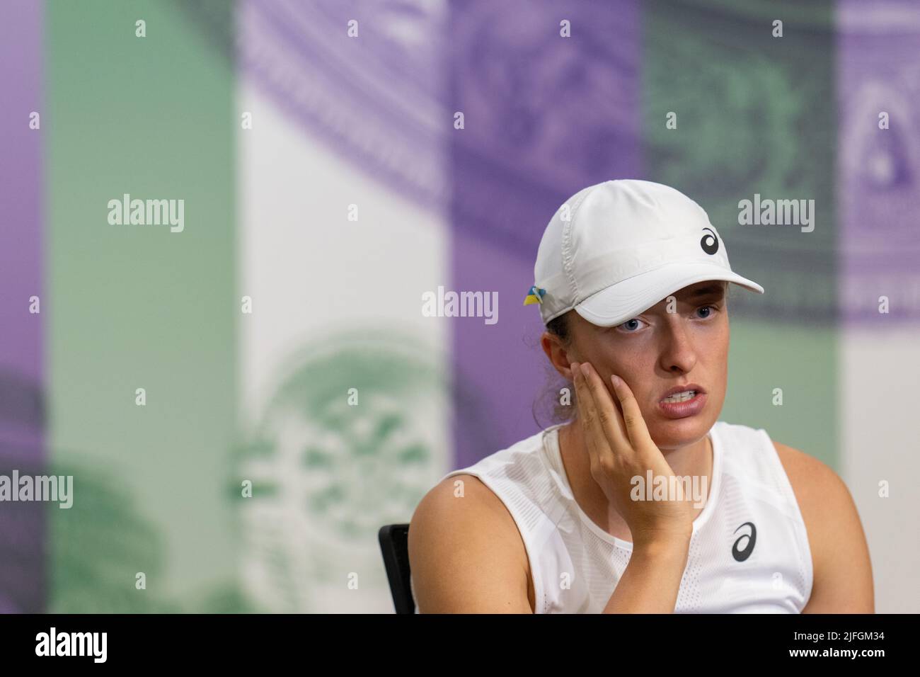 Iga Swiatek speaks to the media in the Main Interview Room following