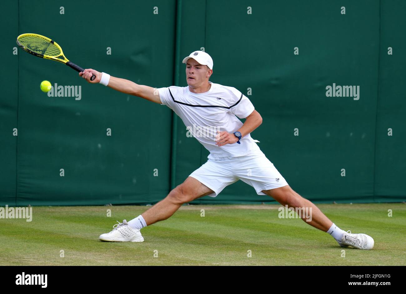 Louis Bowden in action during his Boys Singles first round match against Gabriel Debru during day seven of the 2022 Wimbledon Championships at the All England Lawn Tennis and Croquet Club, Wimbledon. Picture date: Sunday July 3, 2022. Stock Photo