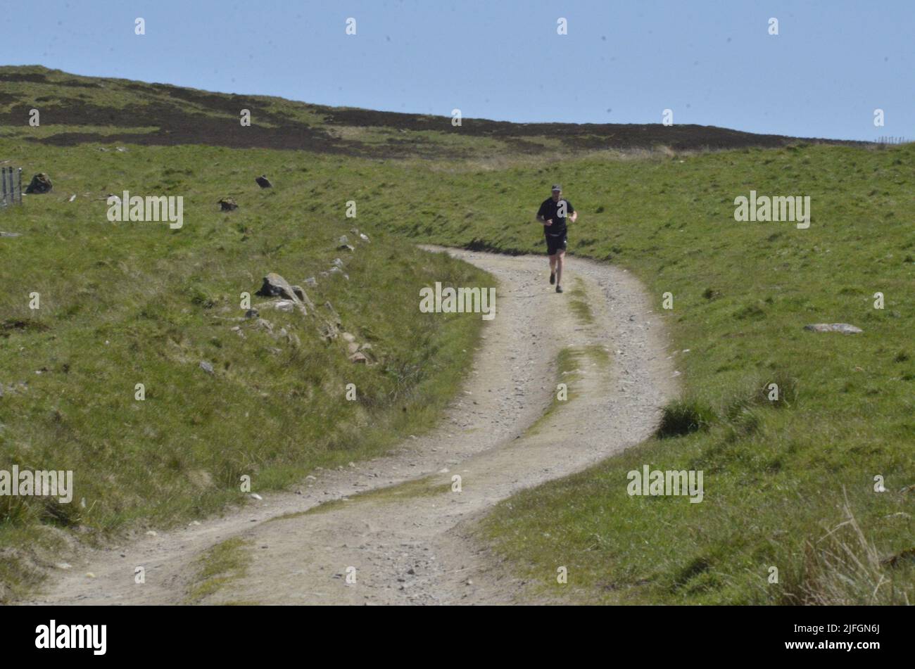 A fell runner at Glen Tilt in the Cairngorms National Park of Scotland UK - Photo: Geopix Stock Photo