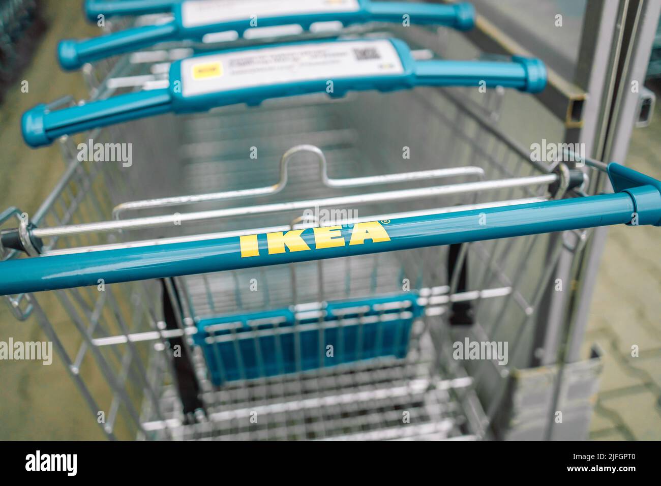 Krakow, Poland - April 26, 2022: Ikea trolleys. IKEA is the world's largest furniture retailer and sells ready to assemble furniture.  Stock Photo