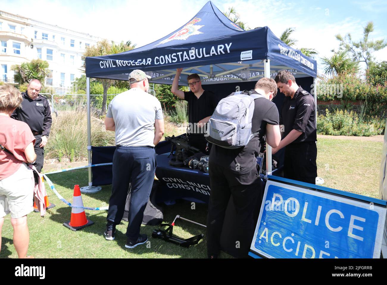 CIVIL NUCLEAR CONSTABULARY POLICE INFORMATION STAND AND POLICE CAR AT A 999 EMERGENCY SERVICES DISPLAY SHOW IN EASTBOURNE Stock Photo