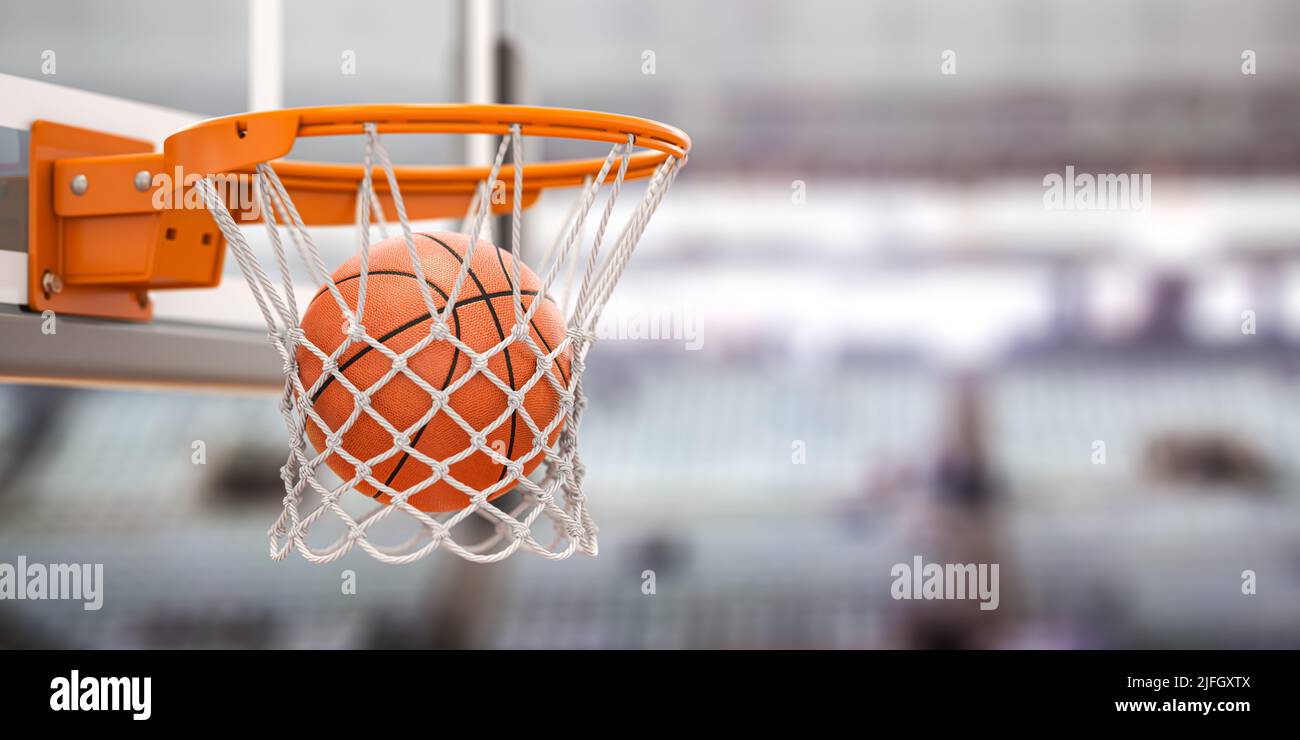Basketball ball scoring the winning points on basketball net hoop on