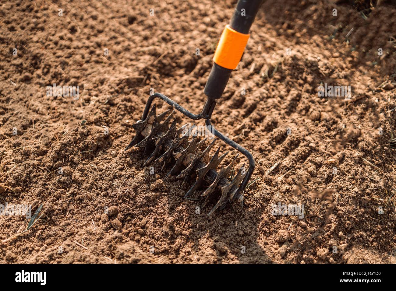 Earth Rake Leveling soil rake tool close hi-res stock photography and images - Alamy