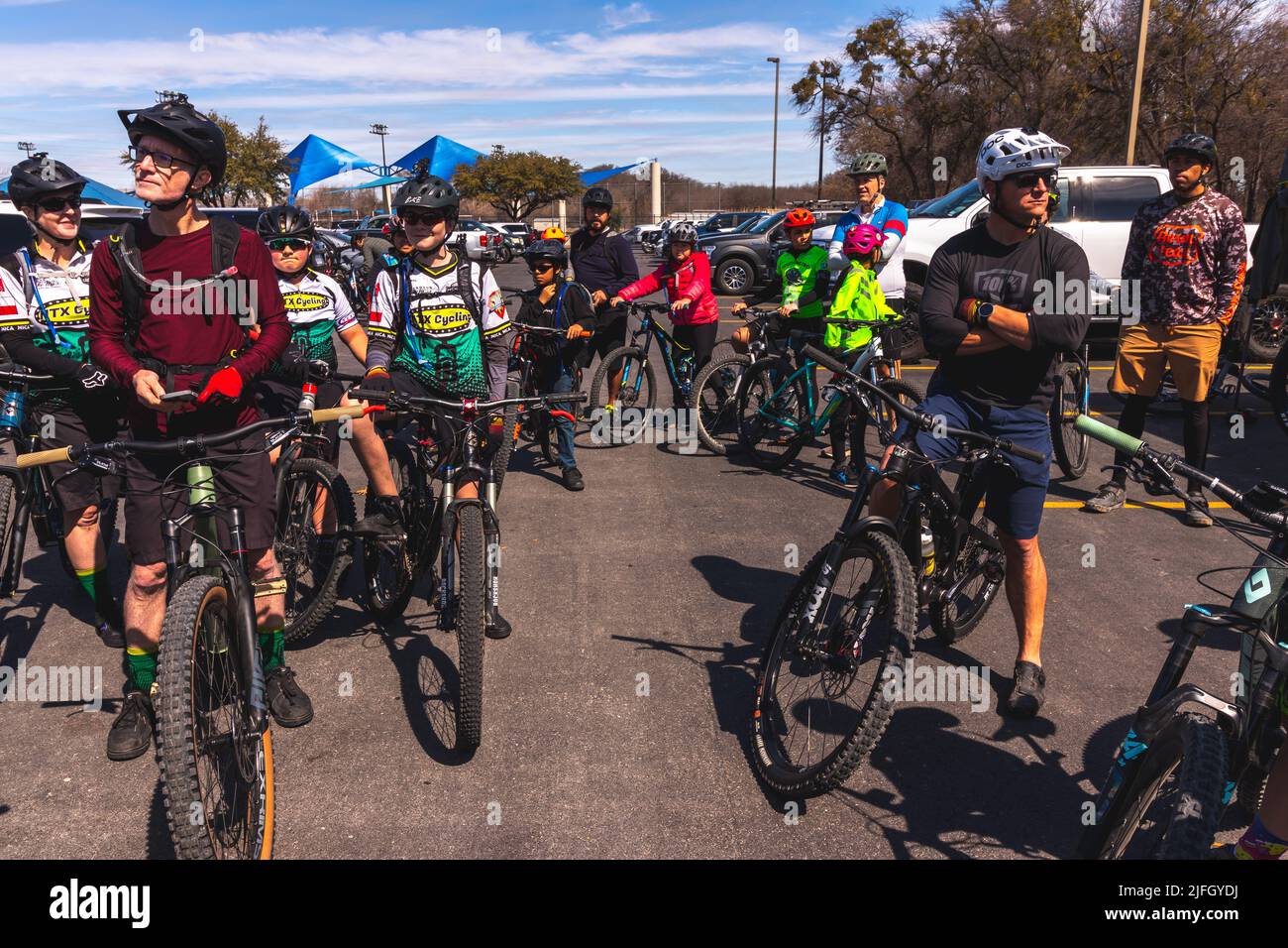 The  Caucasian men getting ready to ride a bike in a race held in the DFW metroplex in Texas Stock Photo