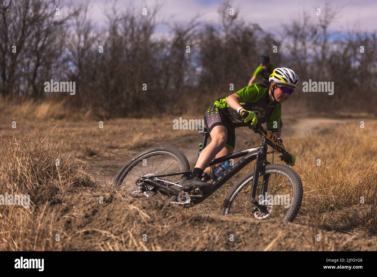 A Caucasian boy riding a bike in a race held in the DFW metroplex in Texas Stock Photo