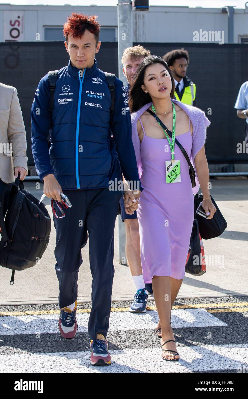 Silverstone, UK. 3rd July 2022, Silverstone Circuit, Silverstone, Northamptonshire, England: British F1 Grand Prix, Race day: Williams Racing driver Alex Albon and his girlfriend arrive at Silverstone Credit: Action Plus Sports Images/Alamy Live News Stock Photo