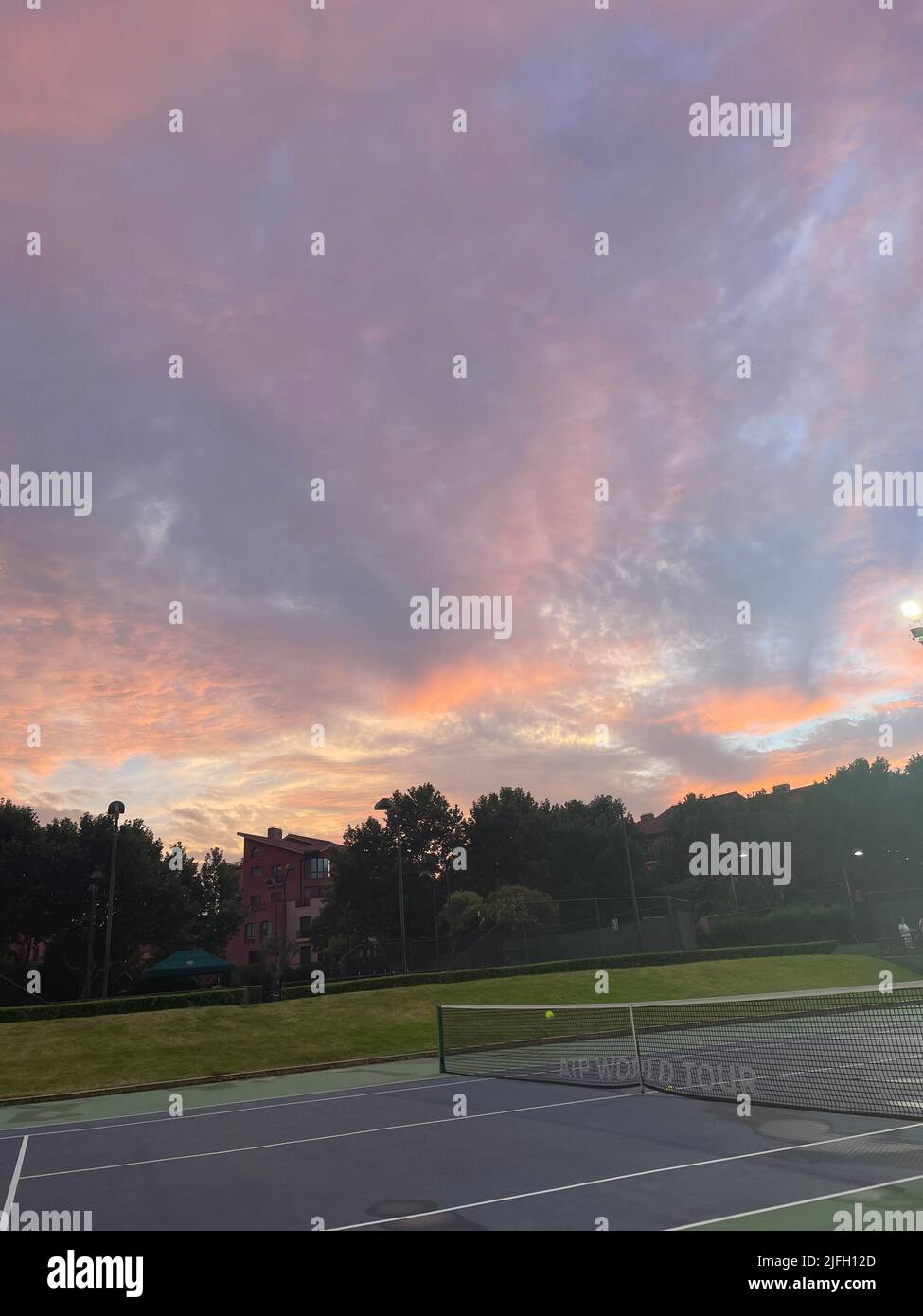 Sunset over the tennis courts in Huacao town, Minhang district, Shanghai Stock Photo