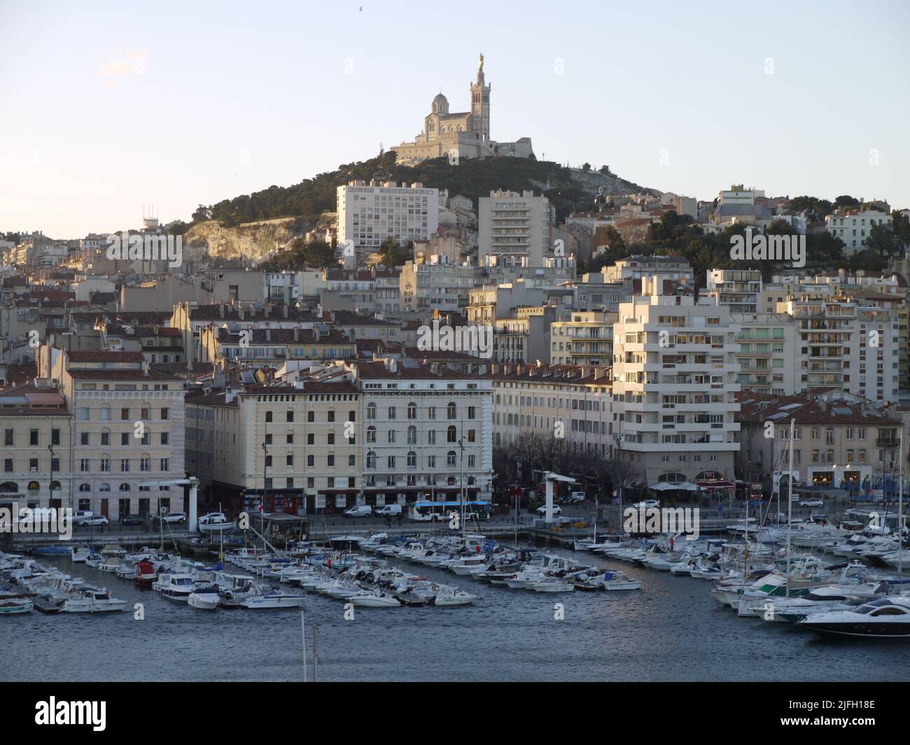 The Old Port of Marseille and the Notre-Dame de la Garde cathedral, which is the emblem of the city Stock Photo