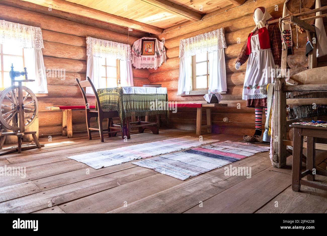 Samara, Russia - September 25, 2021: Ethnocultural complex 'People's Friendship Park'. Interior of traditional Udmurt wooden house built from wood log Stock Photo