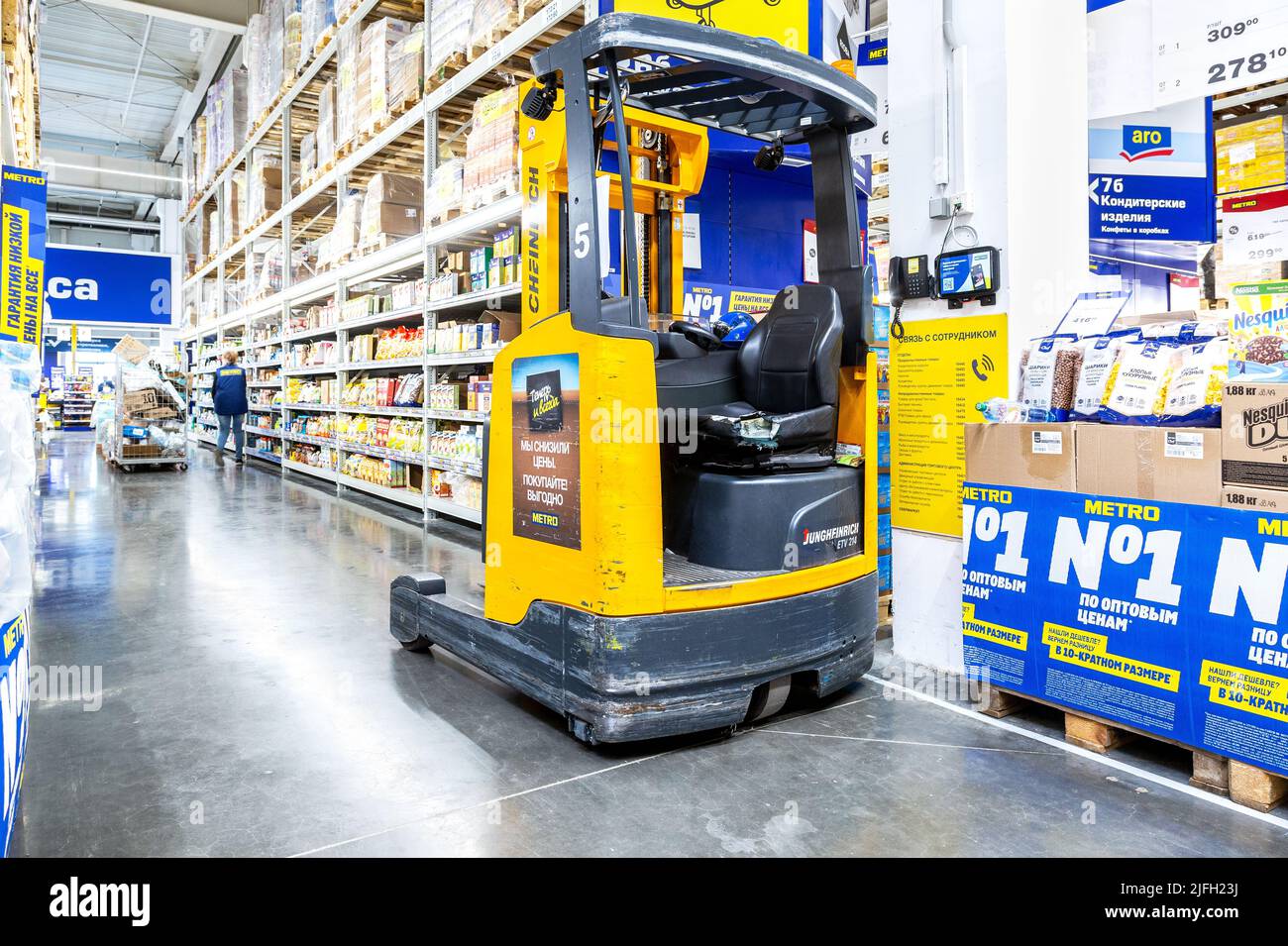 Samara, Russia - June 25, 2022: Warehouse forklift in the Metro store. Metro Group is a German distribution group Stock Photo