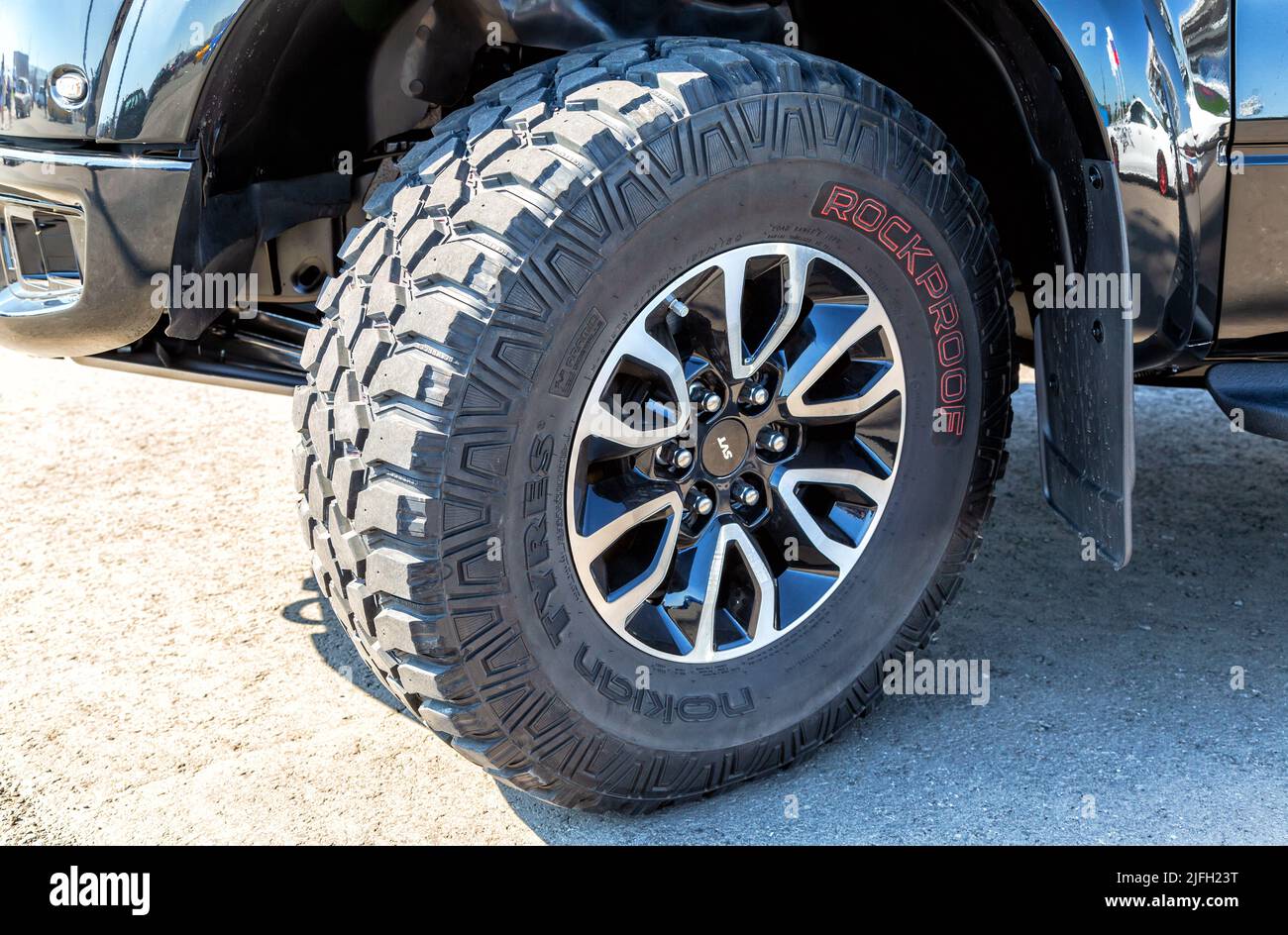 Samara, Russia - June 26, 2022: Offroad car wheel with all terrain tyres Nokian Tyres Stock Photo