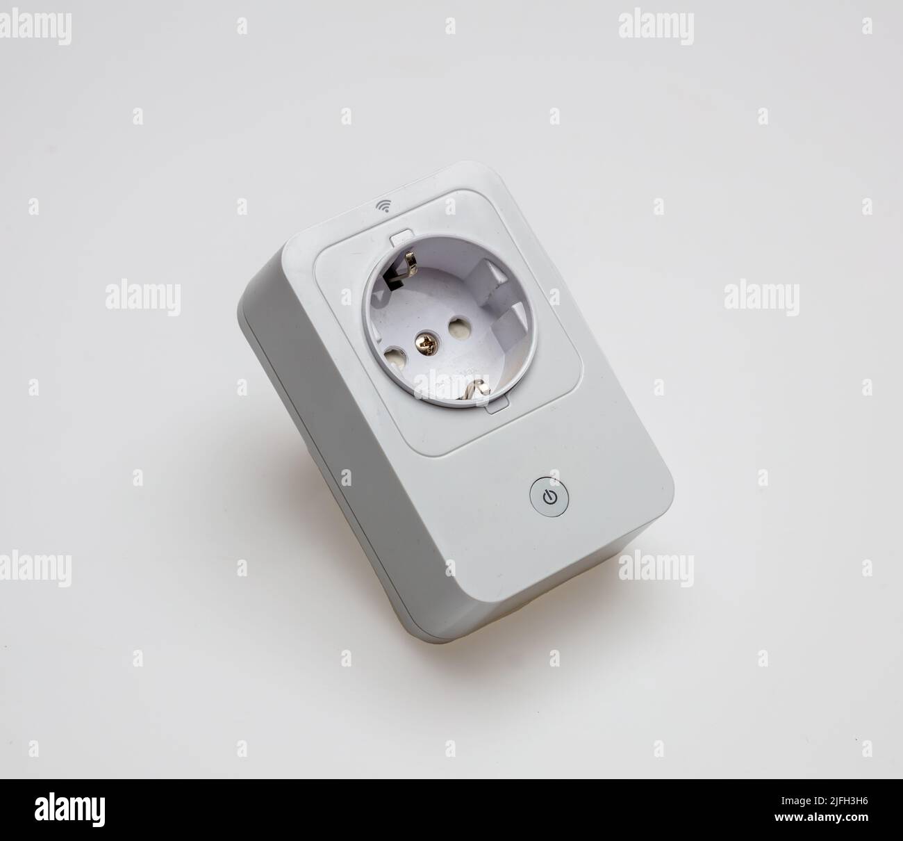 Wi Fi white socket isolated cutout on white background. Smart electric