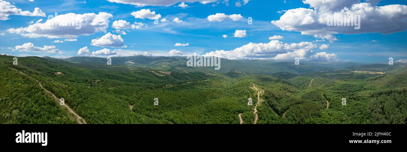 Mount Cholomon, Cholomondas or Holomontas mountain and blue cloudy sky aerial panoramic view. Chalkidiki, Central Macedonia, Greece Stock Photo