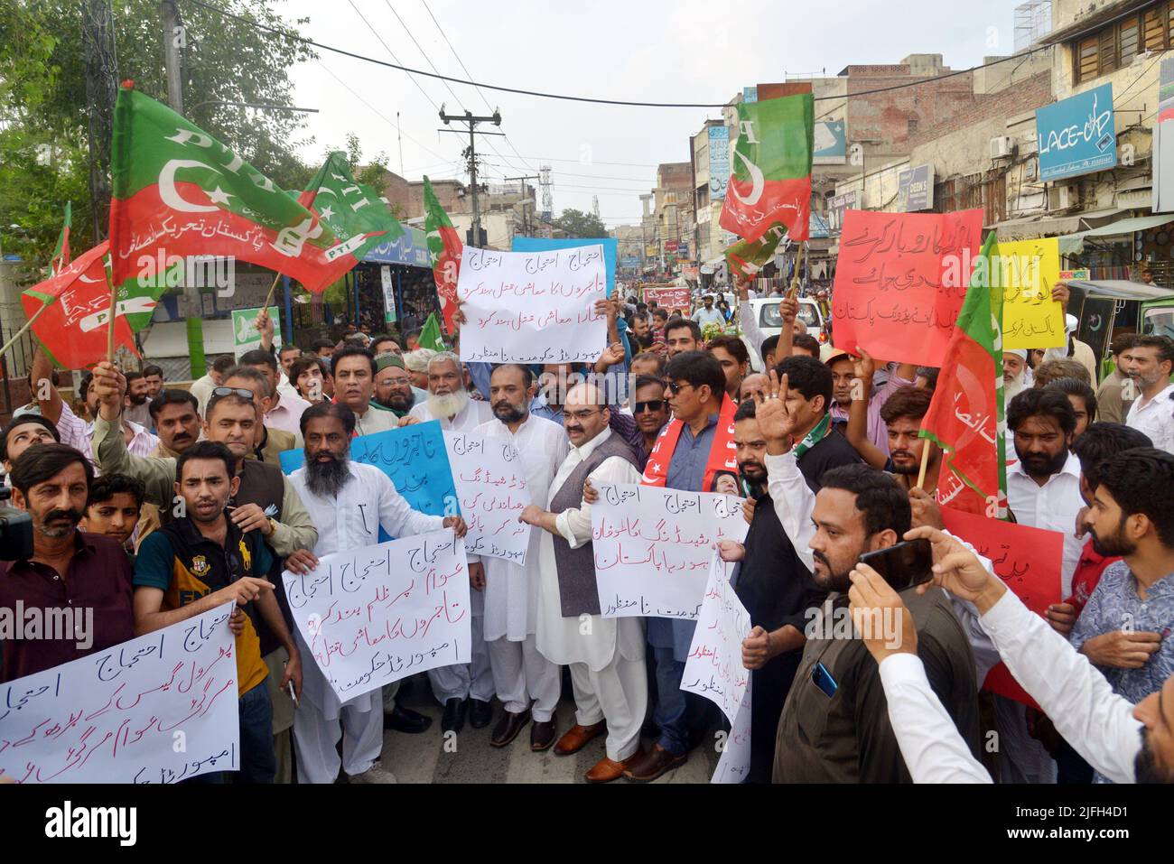 Traders and supporters of Pakistan Tehreek e Insaf (PTI) hold anti-goverment rally against price hike of petroleum and other products at Anarkali Chowk in Lahore, Pakistan, on July 2, 2022. (Photo by Rana Sajid Hussain/Pacific Press/Sipa USA) Stock Photo