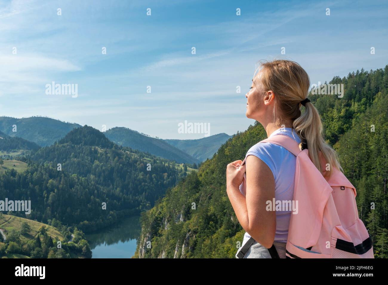 Female hiker standing cliff edge hi-res stock photography and images ...