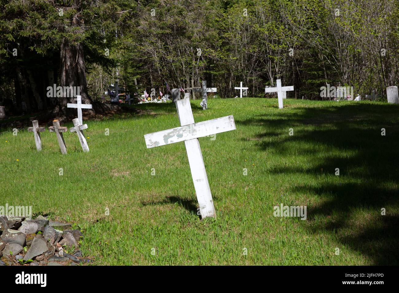 Cemetery with wooden crosses at the historic 1865 Holy Rosary Catholic Church on the Grand Portage Anishinaabe Reservation, Minnesota. Stock Photo