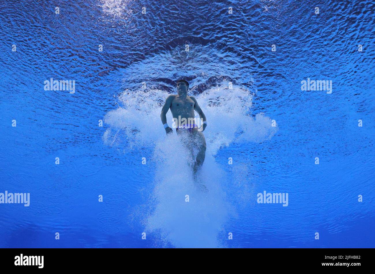 Diving - FINA World Championships - Duna Arena, Budapest, Hungary - July 3, 2022 China's Jian Yang in action during the men's 10m platform final REUTERS/Antonio Bronic Stock Photo