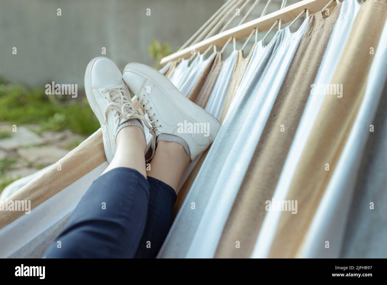 relaxing in the hammock in the summer garden Stock Photo