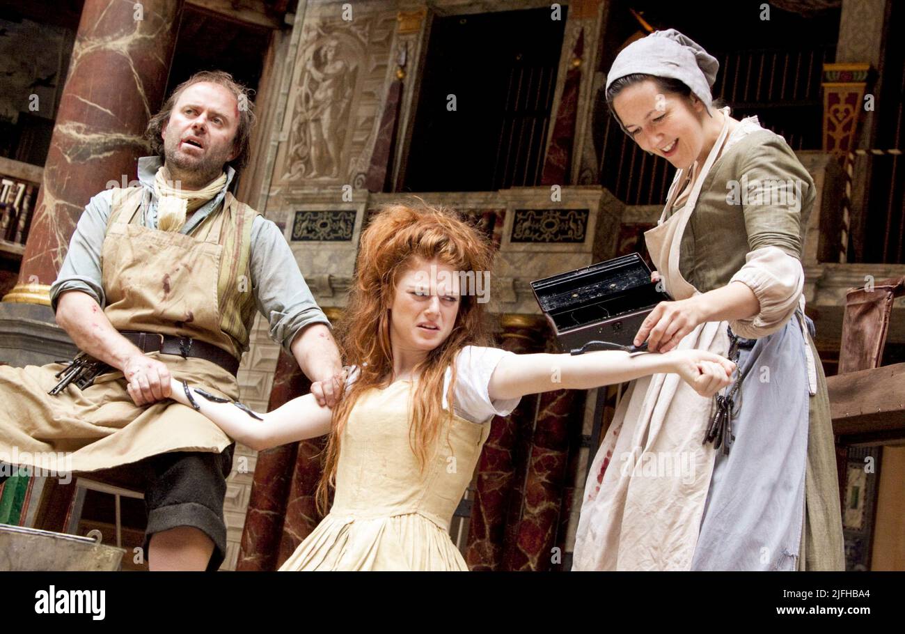 applying leeches - l-r: Patrick Brennan (John), Rose Leslie (May), Sophie Duval (Sal) in BEDLAM by Nell Leyshon at Shakespeare's Globe, London SE1  09/09/2010 design: Soutra Gilmour  director: Jessica Swale Stock Photo