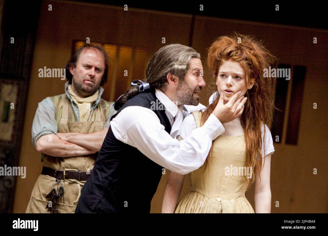 l-r: Patrick Brennan (John), Jason Baughan (Dr Carew), Rose Leslie (May) in BEDLAM by Nell Leyshon at Shakespeare's Globe, London SE1  09/09/2010  design: Soutra Gilmour  director: Jessica Swale Stock Photo