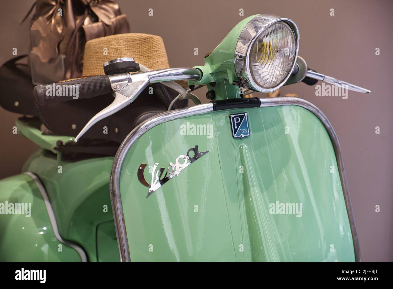 Close up of an Iconic pastel green Vespa Piaggio Stock Photo