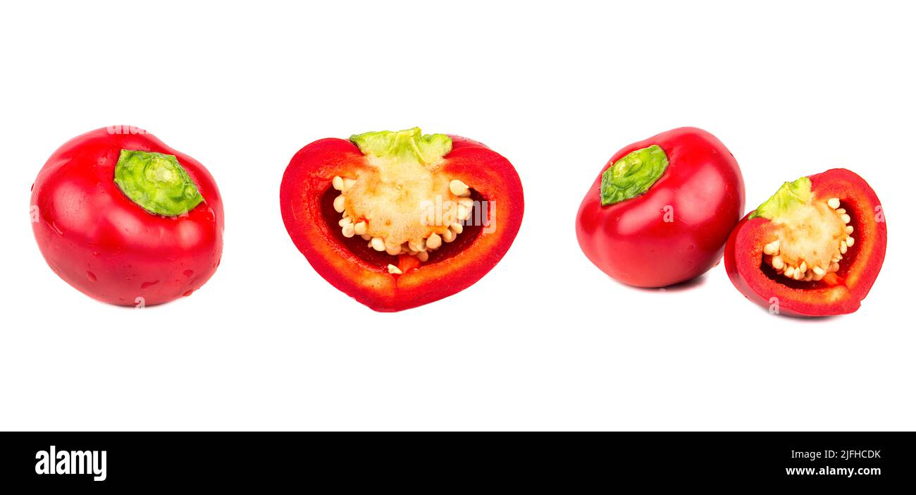 Set of fresh whole and sliced sweet red pepper isolated on white background. Stock Photo
